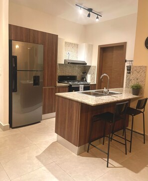 Microwave, oven, stovetop, coffee/tea maker