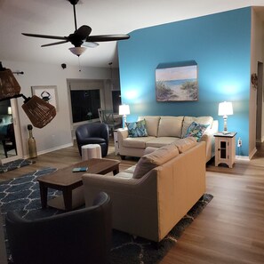 Smart TV, fireplace, books, stereo