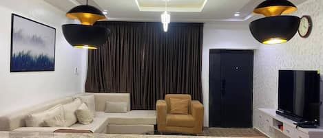 Appartement Familial, balcon, vue ville | Coin séjour