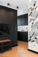 Apartamento Confort, vistas a la ciudad | Sala de estar | Smart TV de 50 pulgadas con canales por cable, Netflix