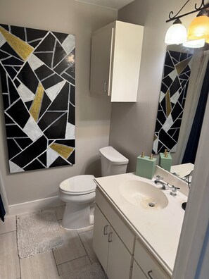Shower, towels, soap, toilet paper