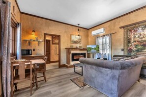 House, Multiple Beds, Hot Tub (2646 Goehmann Ln Cmb) | Living area | Fireplace - The Vines Retreat, Hot-tubs, Game Room, 10-mins to Downtown! (Fredericksburg)