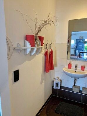 Hair dryer, towels, soap, toilet paper