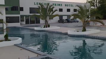 Outdoor pool, open 9:00 AM to 8:00 PM, pool loungers