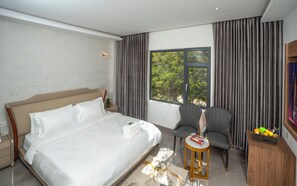 Egyptian cotton sheets, premium bedding, desk, laptop workspace - HOTEL SRI ASHVIK (Rameshwaram)