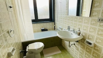 Hair dryer, towels, soap, toilet paper