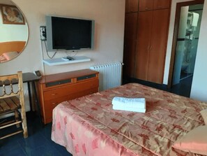 3 habitaciones, tabla de planchar con plancha y wifi