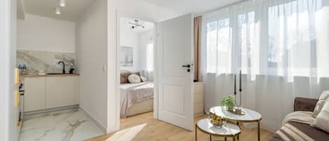 Superior Apartment, City View | Living area | 42-inch Smart TV with cable channels, Netflix, streaming services
