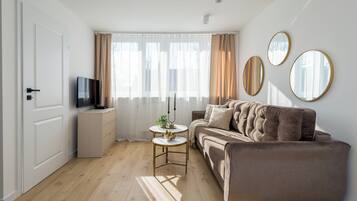 Superior Apartment, City View | Living area | 42-inch Smart TV with cable channels, Netflix, streaming services