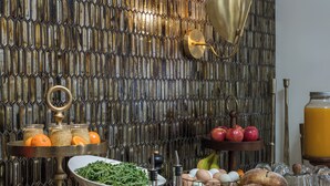 A kitchen counter with various food items and kitchenware. - Casia Inn (Sonoma)