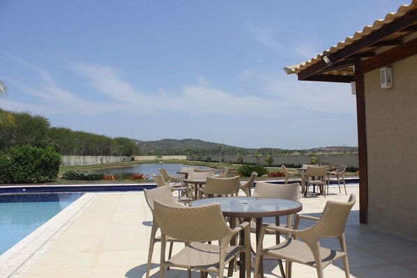 Indoor pool, outdoor pool, open 9:00 AM to 7:00 PM, pool umbrellas
