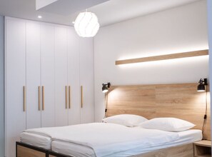 1 habitación, tabla de planchar con plancha, internet y ropa de cama 