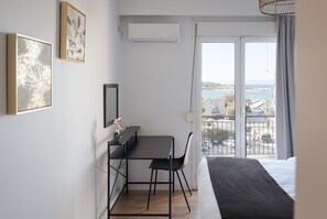 2 quartos, cofres nos quartos, ferros/tábuas de passar roupa
