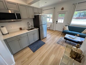 Fridge, microwave, coffee/tea maker, toaster