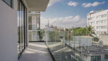 Apartamento ejecutivo, vistas a la ciudad | Terraza o patio
