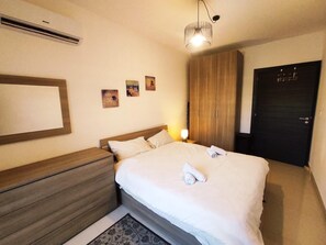 1 chambre, fer et planche à repasser, Wi-Fi, draps fournis