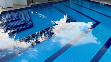 Indoor pool, 2 outdoor pools, open 9:00 AM to 6:00 PM, pool umbrellas