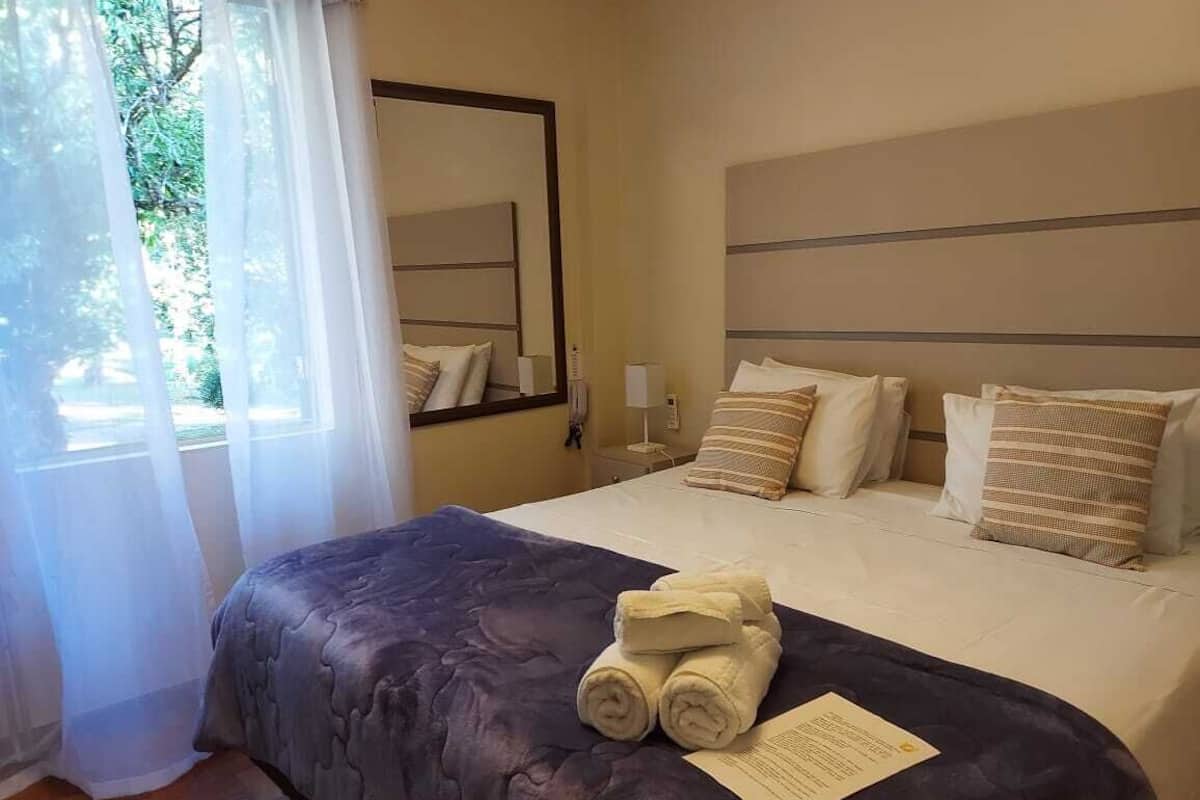 Comfort kamer, 1 twee- of 2 eenpersoonsbedden, uitzicht op tuin | 1 slaapkamer, luxe beddengoed, Select Comfort-bedden