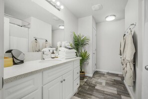 Hair dryer, towels, soap, shampoo