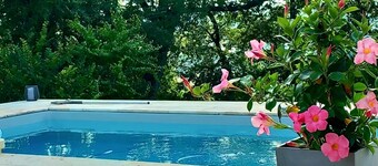 Large stone gîte for 12 people, swimming pool and boules pitch.