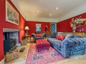 Smart TV, fireplace, DVD player, books