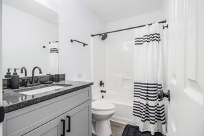 Hair dryer, towels, soap, toilet paper