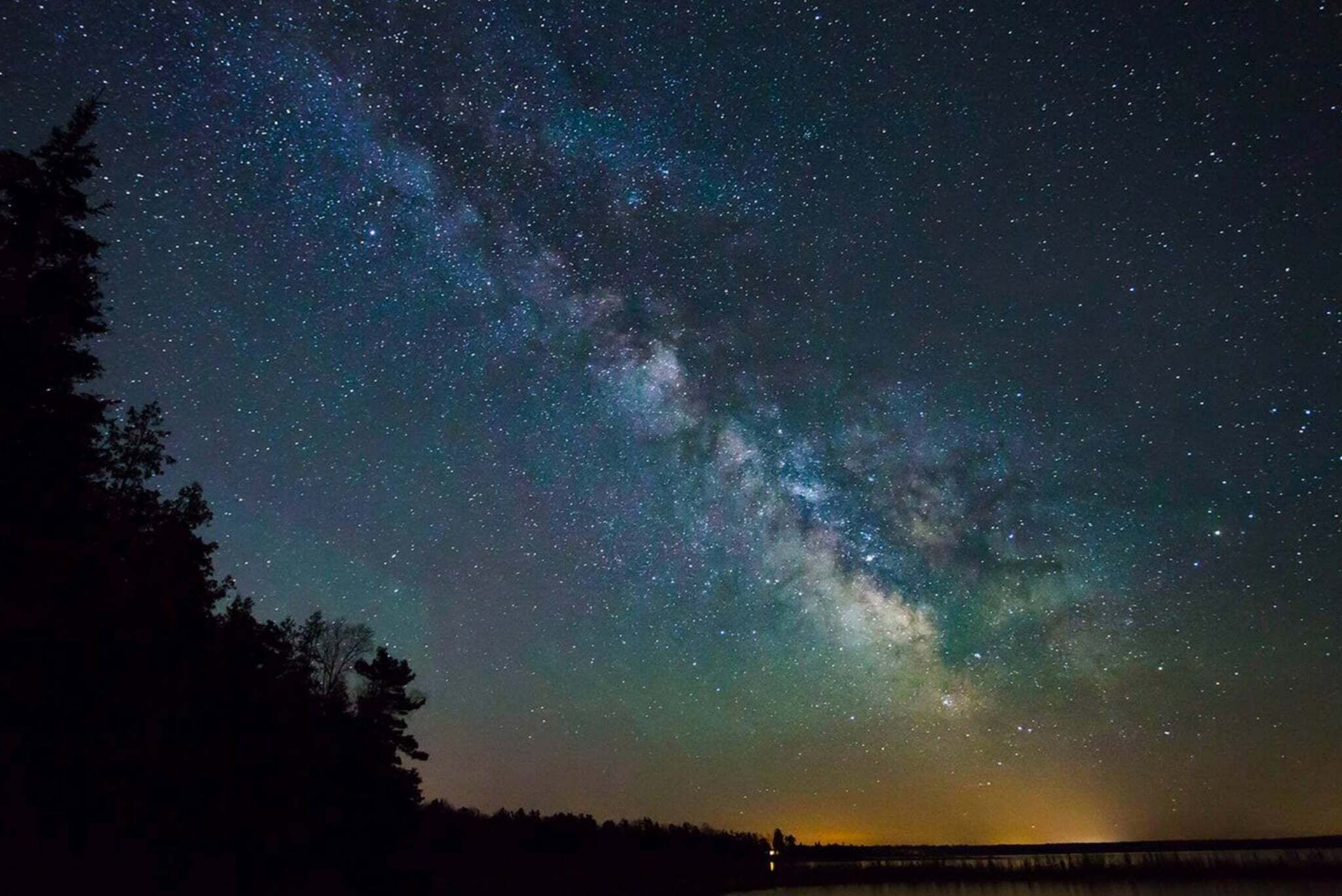 A night sky filled with stars and the Milky Way.