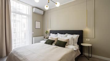 Apartamento conforto, 2 quartos | 2 quartos, cortinas blackout, ferros/tábuas de passar roupa