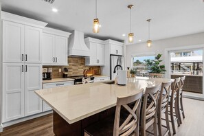 Fridge, microwave, oven, stovetop - 218: Stunning Heated Pool Home w/ Dock Access + Walk to Beach! (Fort Myers Beach)