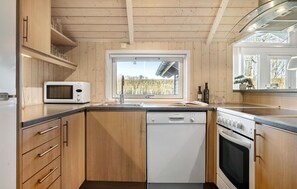 Fridge, stovetop, dishwasher, coffee/tea maker