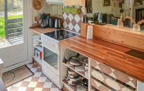Fridge, stovetop, dishwasher, coffee/tea maker