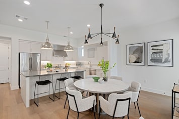 Luxurious kitchen and spacious dining area offer the perfect dining experience