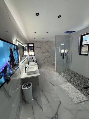 Shower, hair dryer, towels, soap