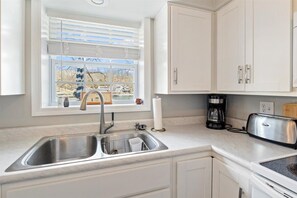 Fridge, microwave, oven, stovetop - Perfect Family House in Osage Beach with Expansive Deck, Private Dock, & Boat Slip (Osage Beach)