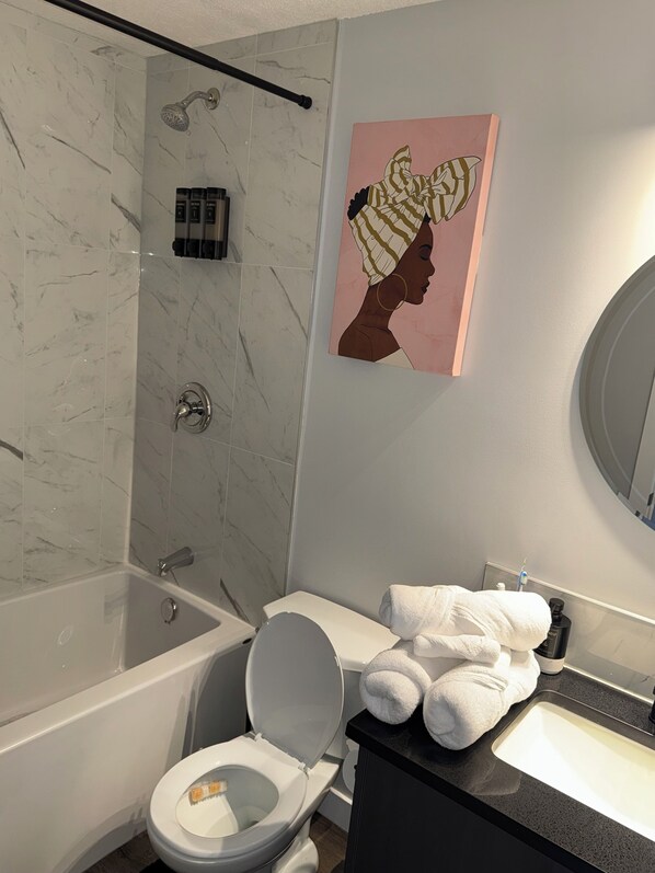 Hair dryer, towels, soap, shampoo