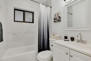 Hair dryer, towels, soap, toilet paper