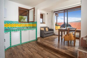 Living area - The house of Aeolus facing the sunset (Santa Teresa Gallura)