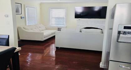 Elegant 5BR Family Oasis – 5 Mins to JFK, Walk to Mall & Train, Free Parking!