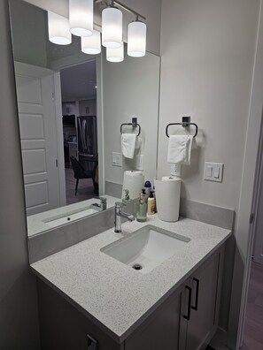Hair dryer, towels, soap, toilet paper