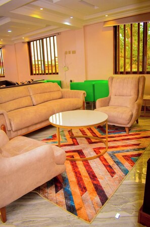 Deluxe-Doppelzimmer | Wohnbereich