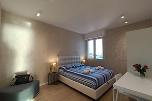 2 bedrooms, in-room safe, iron/ironing board, travel cot -  Elegant and modern seafront flat in Lido di Camaiore, located on the 4th floor with lift, perfect for a relaxing and comfortable holiday.The flat boasts a large terrace with sea view, equipped with an awning and dining table, ideal for enjoying panorami (Camaiore)