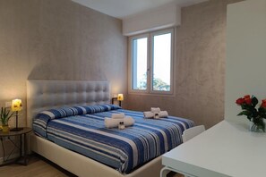 2 chambres, fer et planche à repasser, Wi-Fi, draps fournis