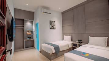 Chambre Deluxe avec lits jumeaux | Bureau, espace de travail pour ordinateur portable, Wi-Fi gratuit