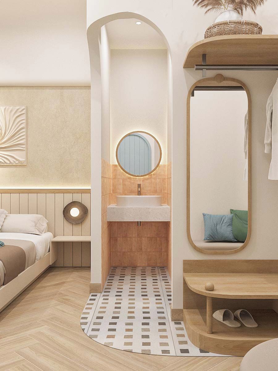 Une salle de bain moderne avec un lavabo sur pied, un miroir rond et un meuble-lavabo en bois.