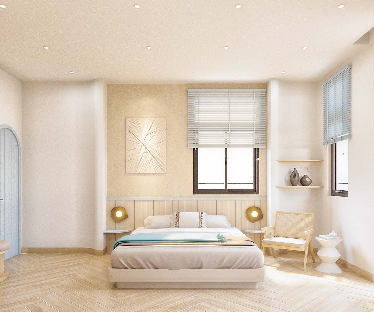 A spacious bedroom with a large bed, bedside tables, a wall-mounted artwork, and a window with blinds.