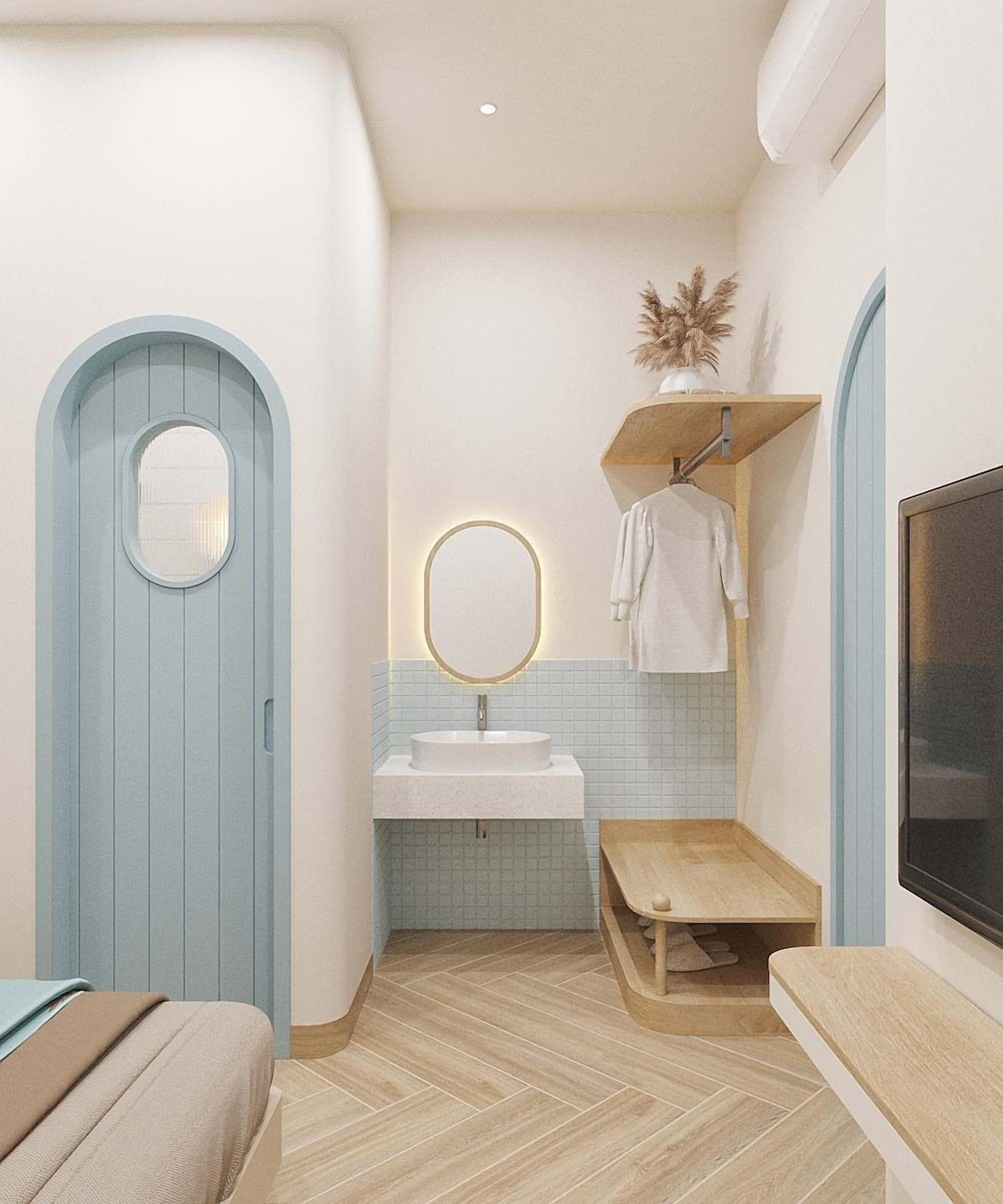 Casa de banho compacta com lavatório, espelho e porta-toalhas.