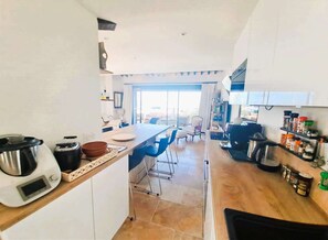 Fridge, oven, cookware/dishes/utensils