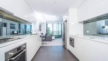 Fridge, microwave, oven, cookware/dishes/utensils