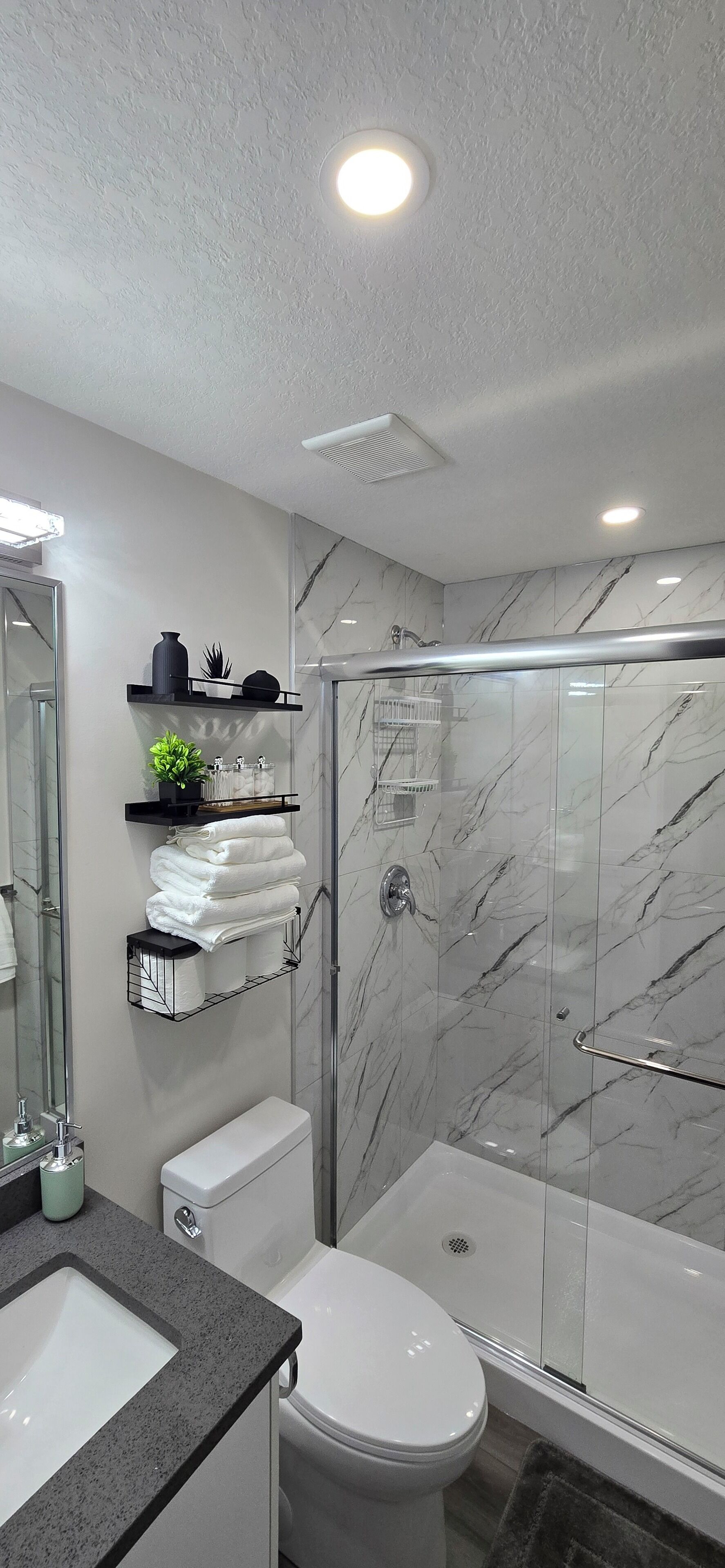 Hair dryer, towels, soap, shampoo