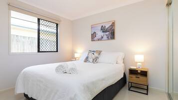 2 bedrooms, desk, laptop workspace, iron/ironing board